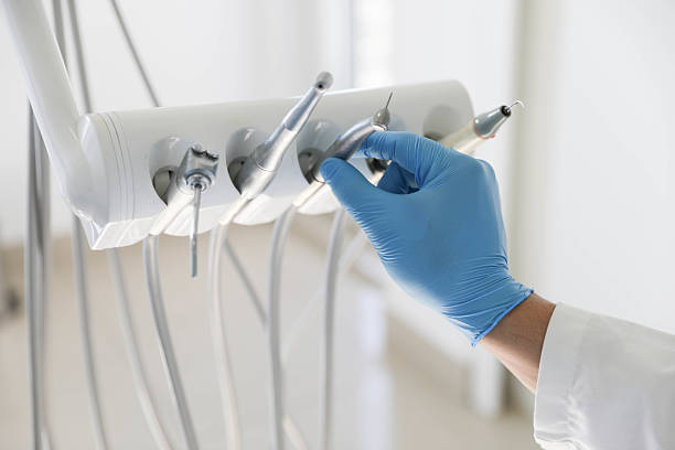 Professional Tooth Extraction technician working in Brunswick County County, VA